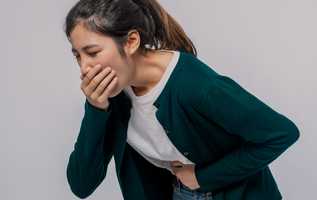  person feeling sick and nauseous