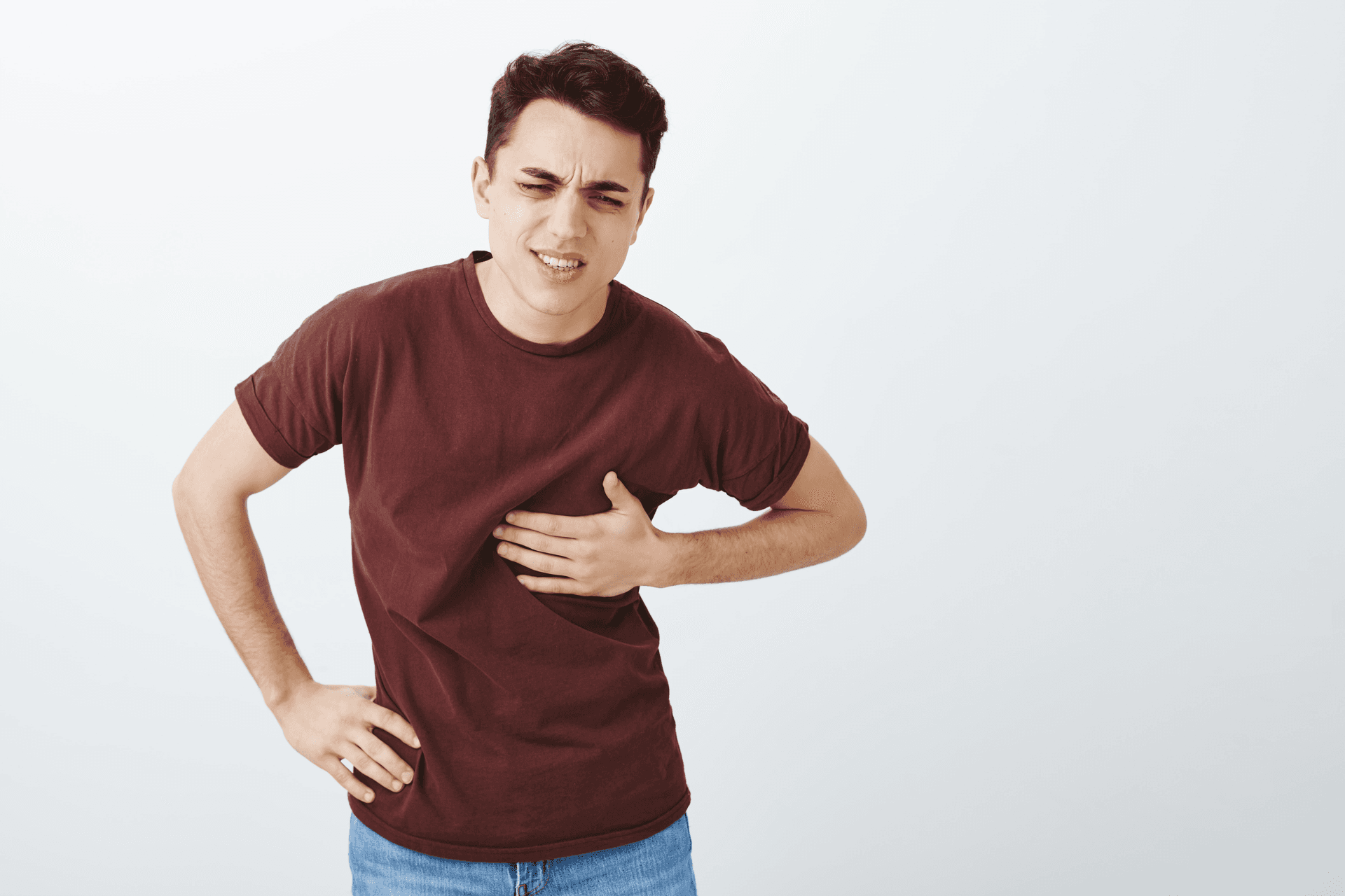 Man experiencing heartburn